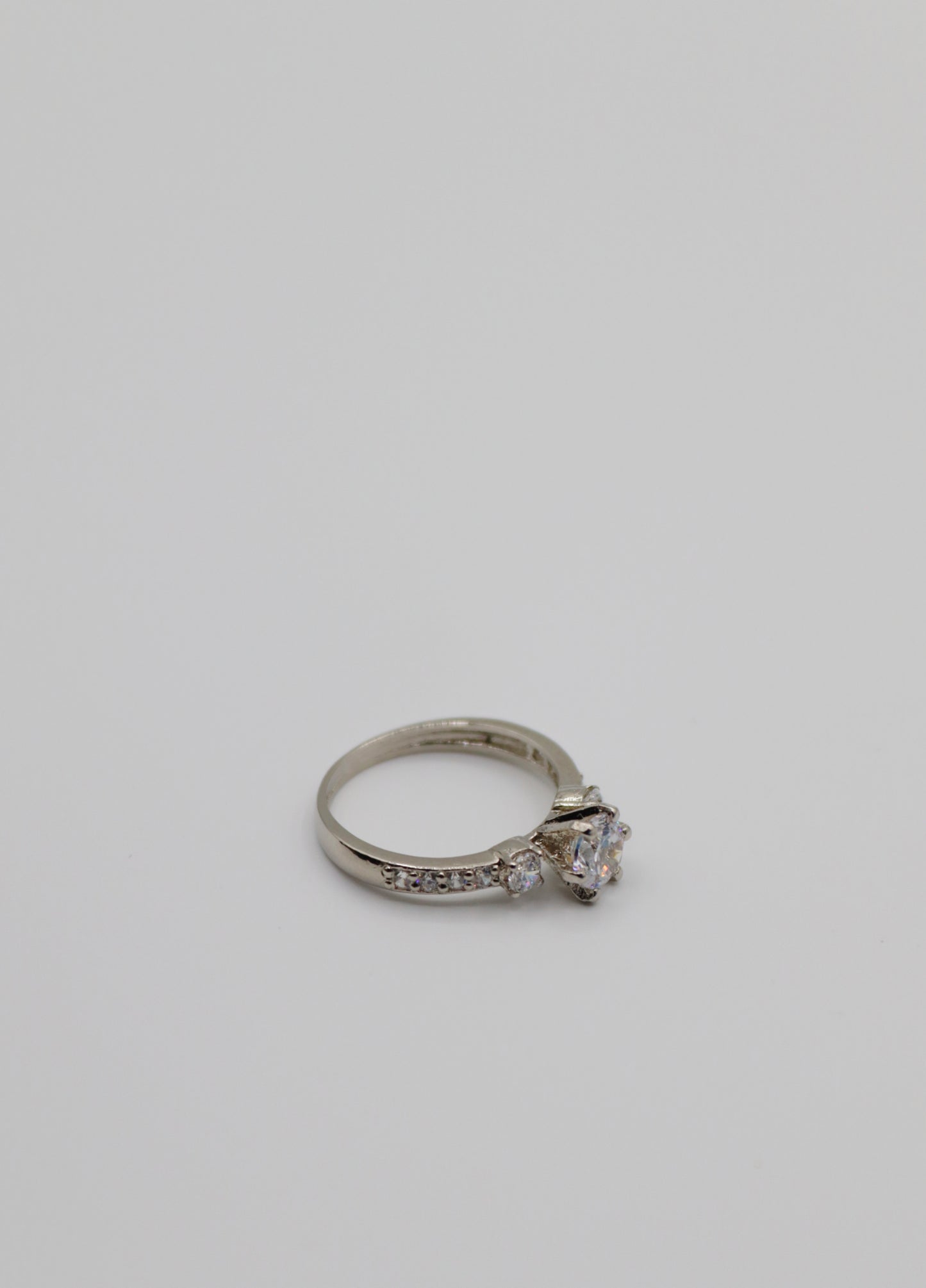 Radiant Three-Stone Sterling Silver Ring with Pavé Accents