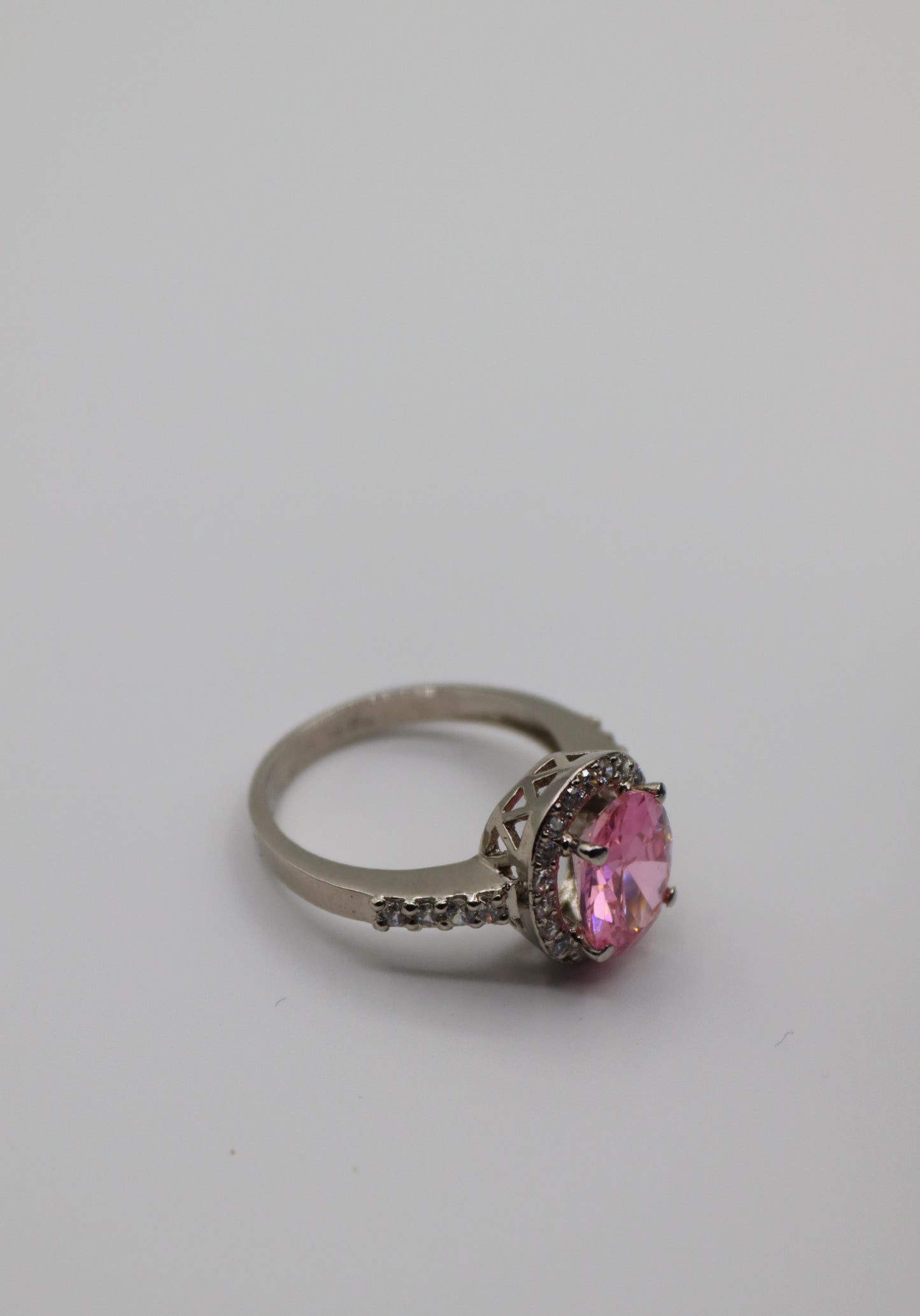 Elegant Pink Sapphire Halo Engagement Ring – Sterling Silver