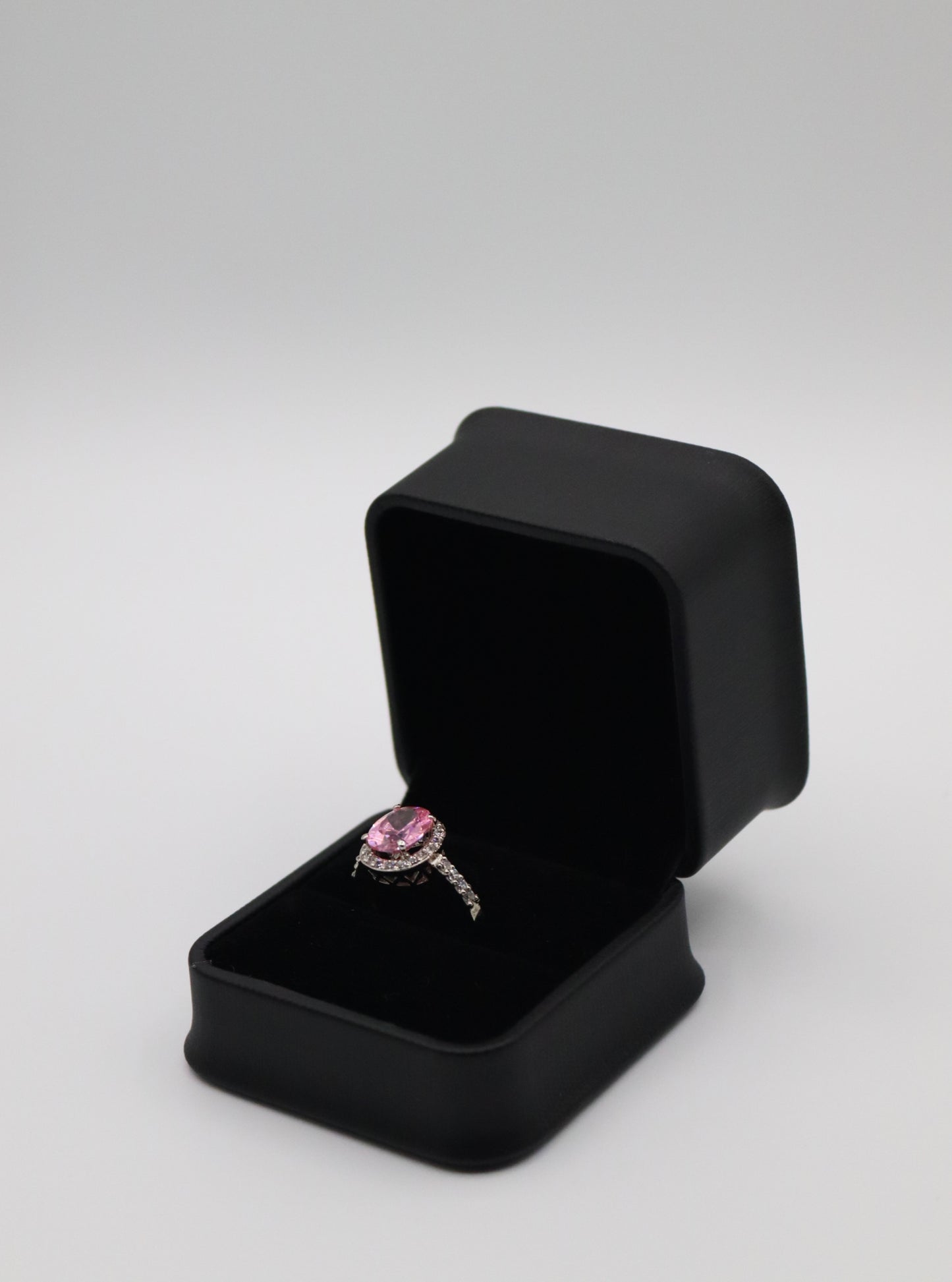 Elegant Pink Sapphire Halo Engagement Ring – Sterling Silver